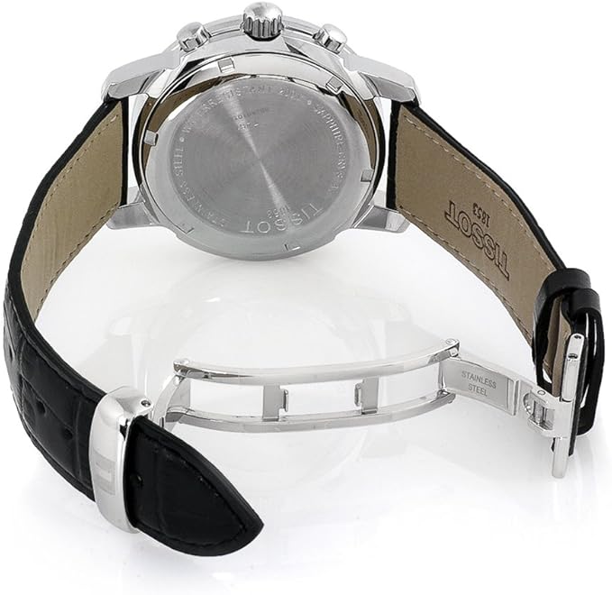 Tissot PRC200 watch displayed on wrist showing caseback and black leather strap