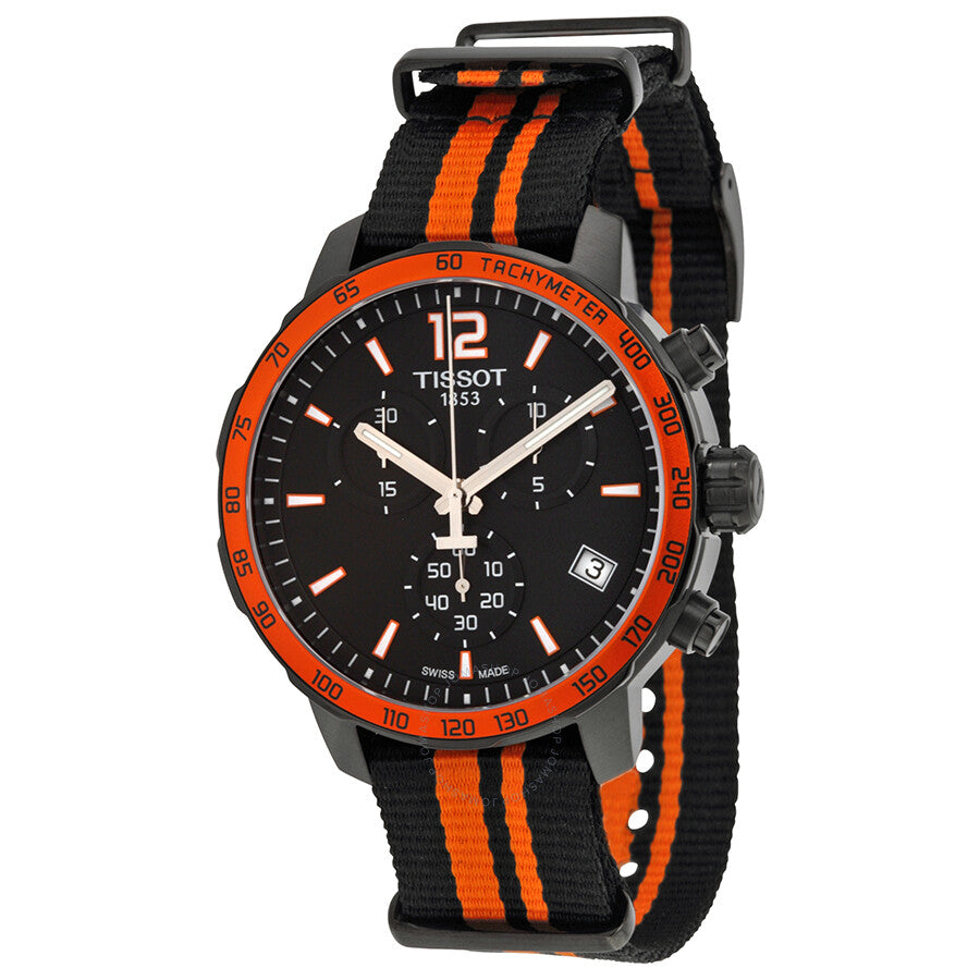 Tissot Quickster Chronograph with black dial, orange bezel, white chronograph hands, and orange-striped black nylon strap