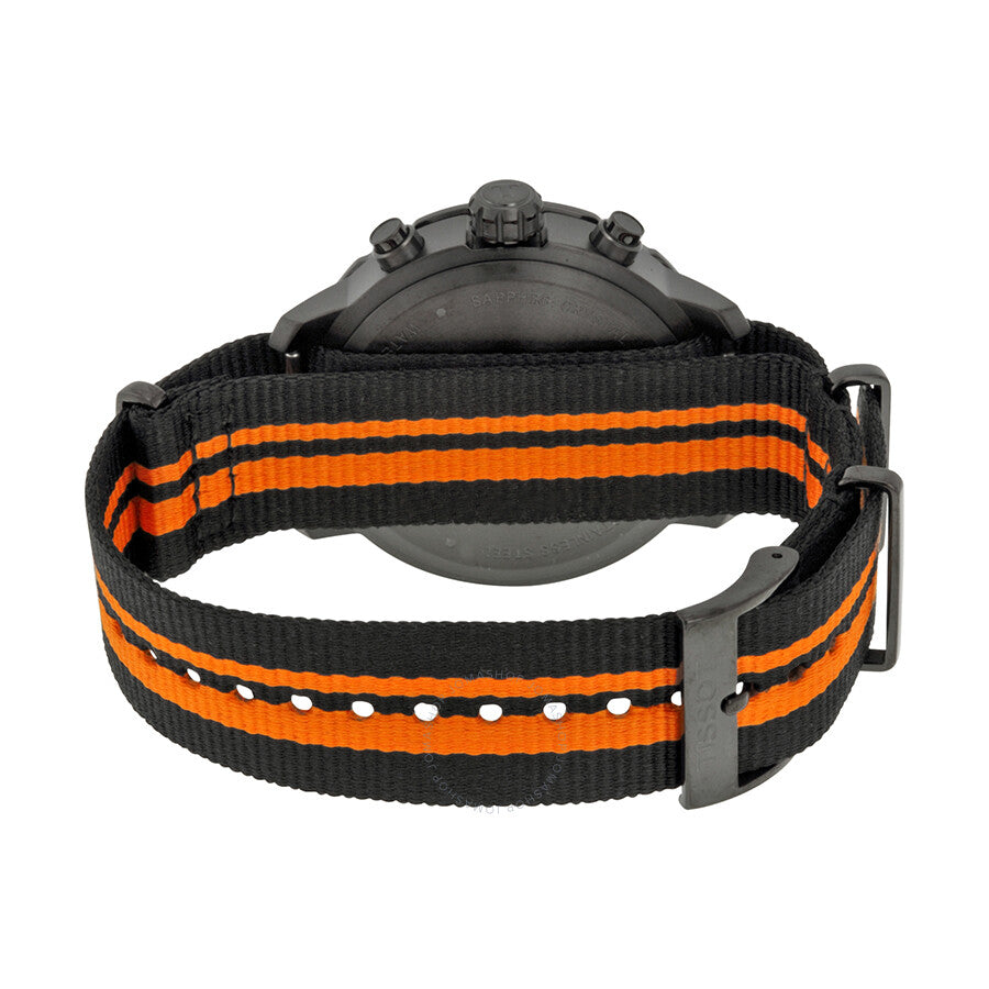 Caseback view of Tissot Quickster chronograph with orange and black striped nylon NATO-style strap