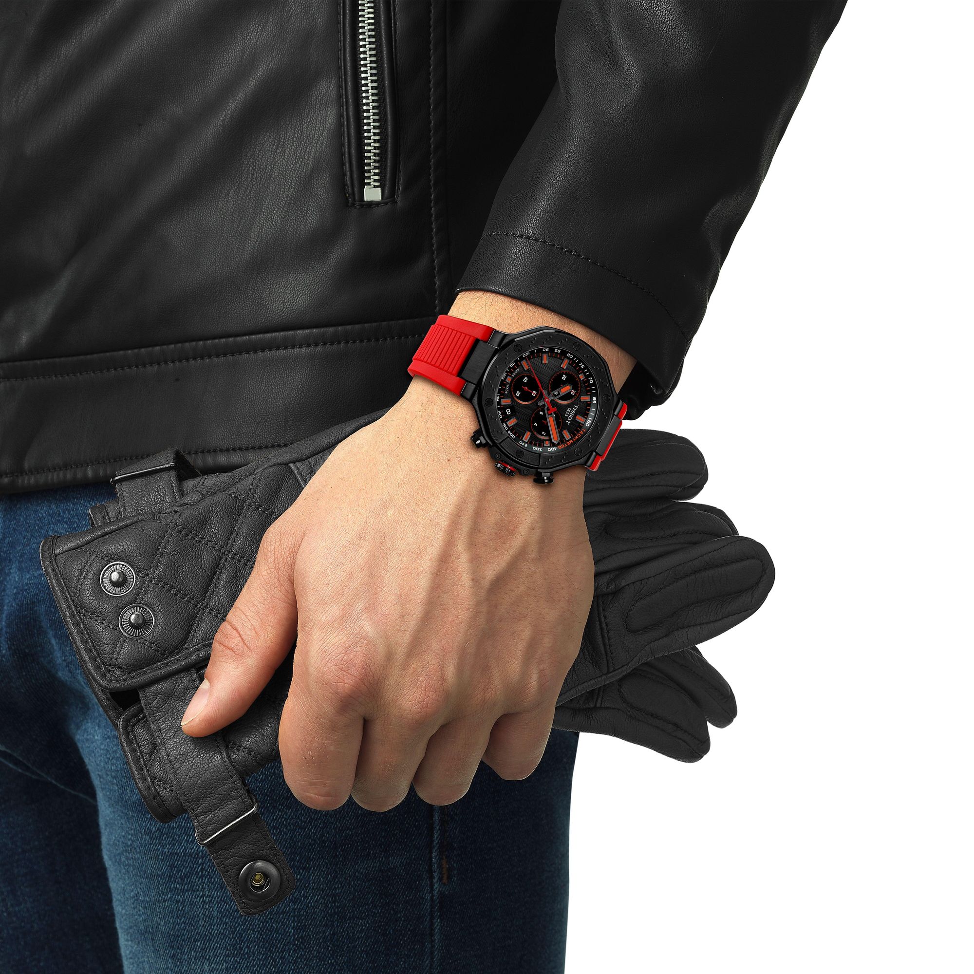 Tissot T-Race chronograph worn on wrist, black dial with orange chronograph hands visible