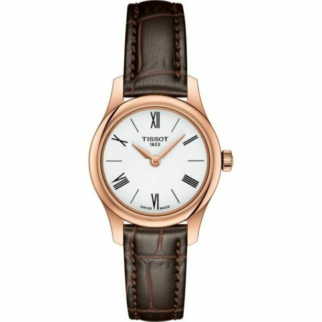 Tissot Tradition women's watch with white dial, rose gold case, and brown leather strap