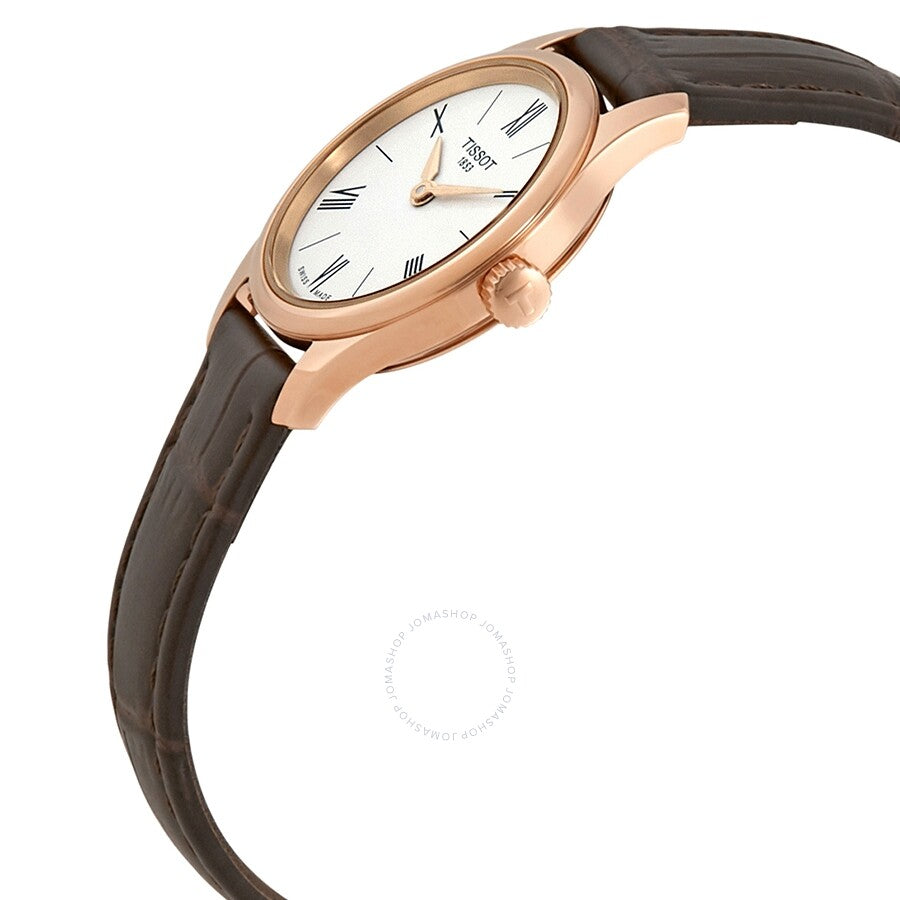 Side angle view of Tissot Tradition Thin watch showing rose gold case profile and leather strap