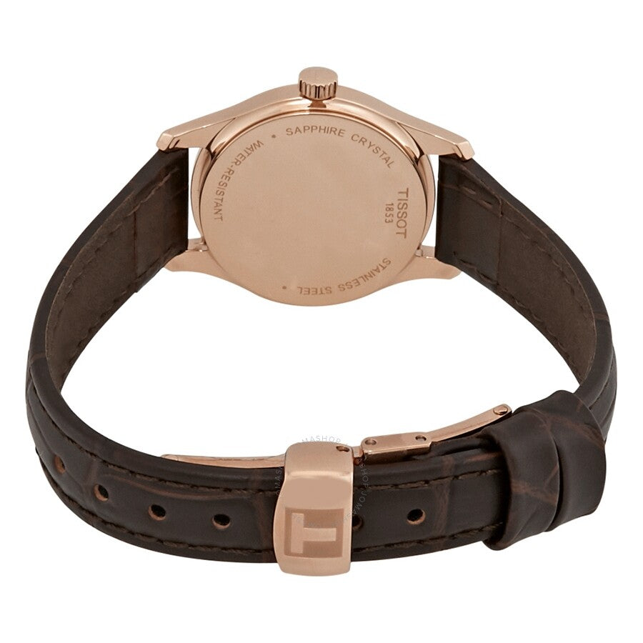 Caseback of Tissot Tradition Thin watch with sapphire crystal and leather strap clasp visible