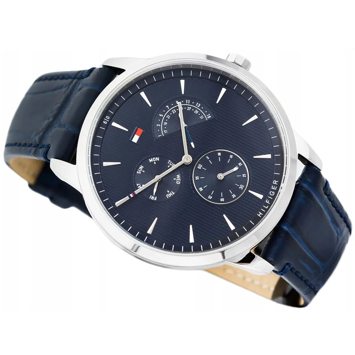 Tommy Hilfiger 1710387 chronograph watch at angle with blue dial and leather strap detail