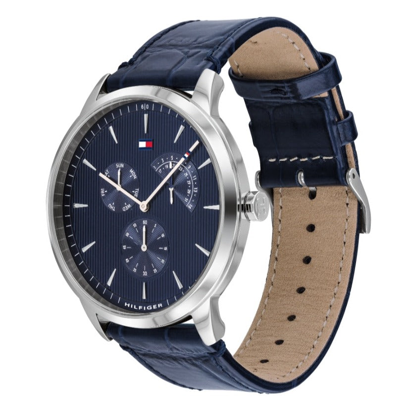 Tommy Hilfiger 1710387 watch side view showing navy leather strap with tan interior and silver buckle