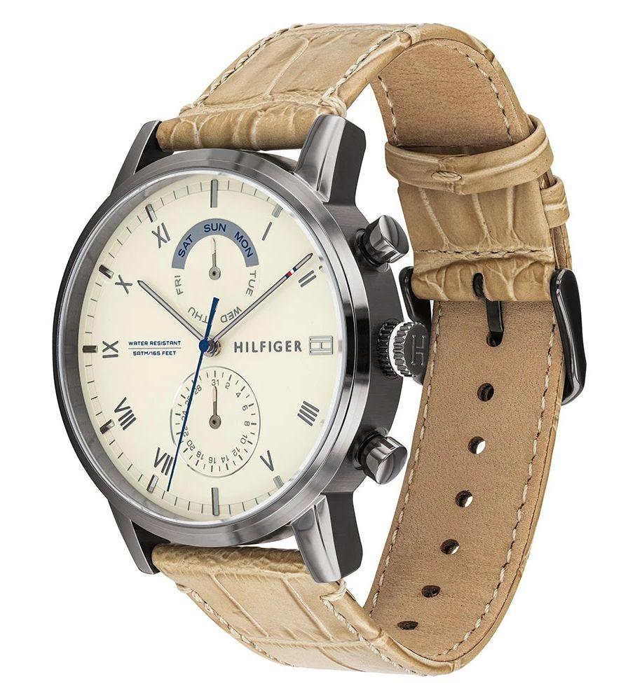 Tommy Hilfiger multi-function watch on tan leather crocodile-textured strap, angled side view