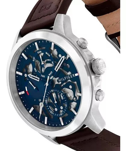 Tommy Hilfiger watch side profile displaying pushers and stainless steel case