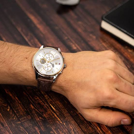 Tommy Hilfiger 1710501 quartz watch worn on wrist with silver dial and chronograph subdials