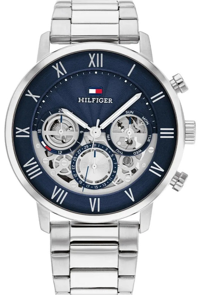 Tommy Hilfiger Legend chronograph watch with blue dial, Roman numerals, and silver steel bracelet
