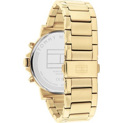 Back view of Tommy Hilfiger gold watch showing caseback and solid gold bracelet