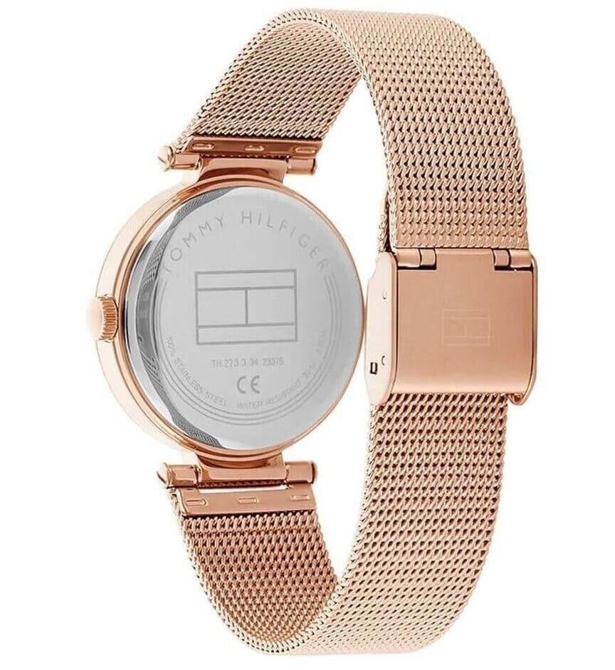 Case back view of Tommy Hilfiger 1781868 women's watch showing stainless steel back and rose gold mesh band