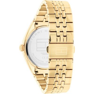 Tommy Hilfiger gold women's watch caseback showing transparent case with engraved details