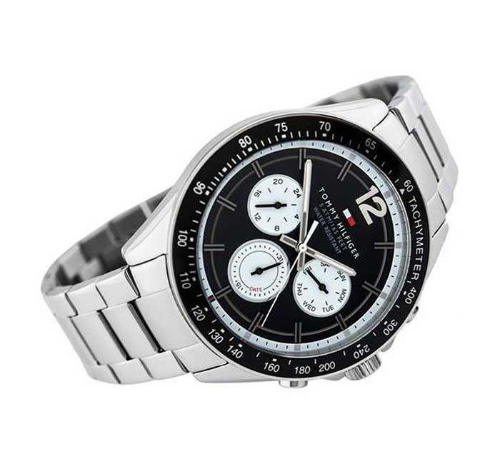 Tommy Hilfiger chronograph watch angled view showing black dial and stainless steel band