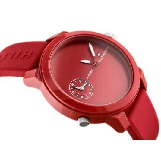 Tommy Hilfiger 1791323 men's watch worn on wrist with red strap