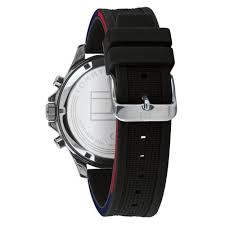Tommy Hilfiger watch caseback and side profile showing stainless steel case and black rubber strap