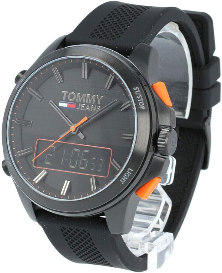 Tommy Hilfiger 1791763 hybrid watch worn on wrist with black strap and orange trim