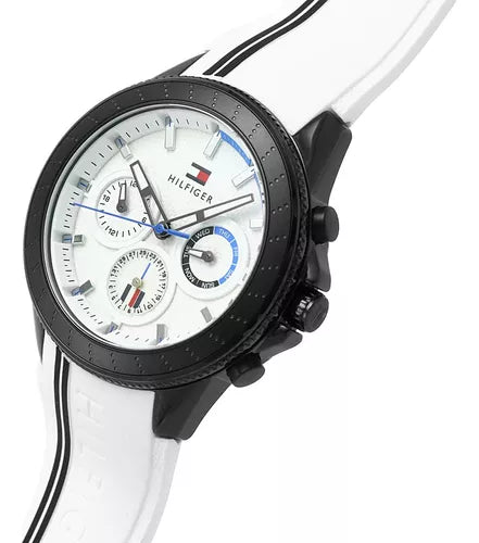Angled view of Tommy Hilfiger multifunction watch showing white dial and black case