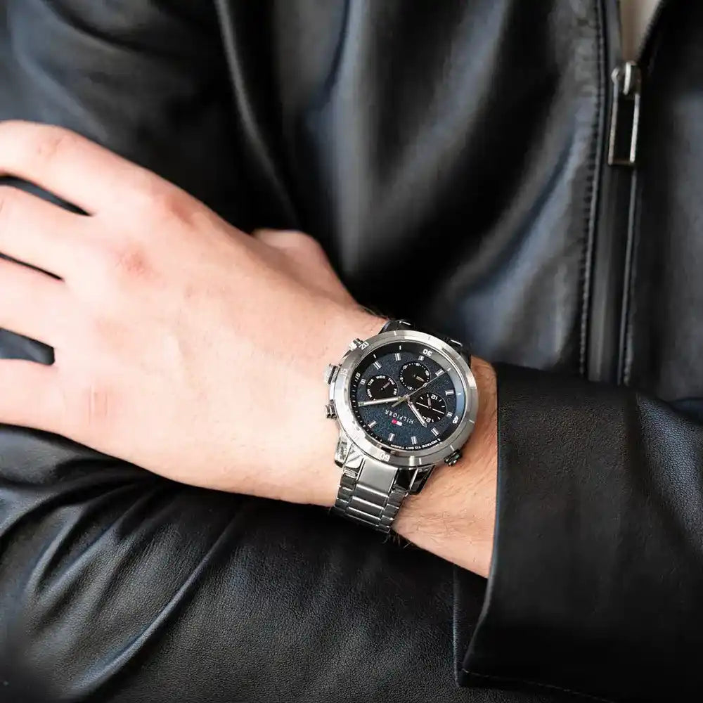 Tommy Hilfiger Troy chronograph watch worn on wrist with silver bracelet