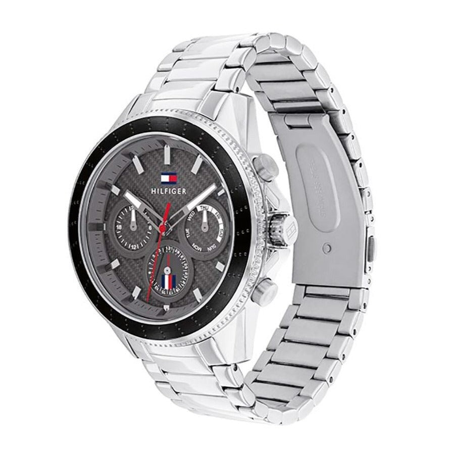 Tommy Hilfiger Aiden chronograph watch shown at three-quarter angle with silver steel bracelet