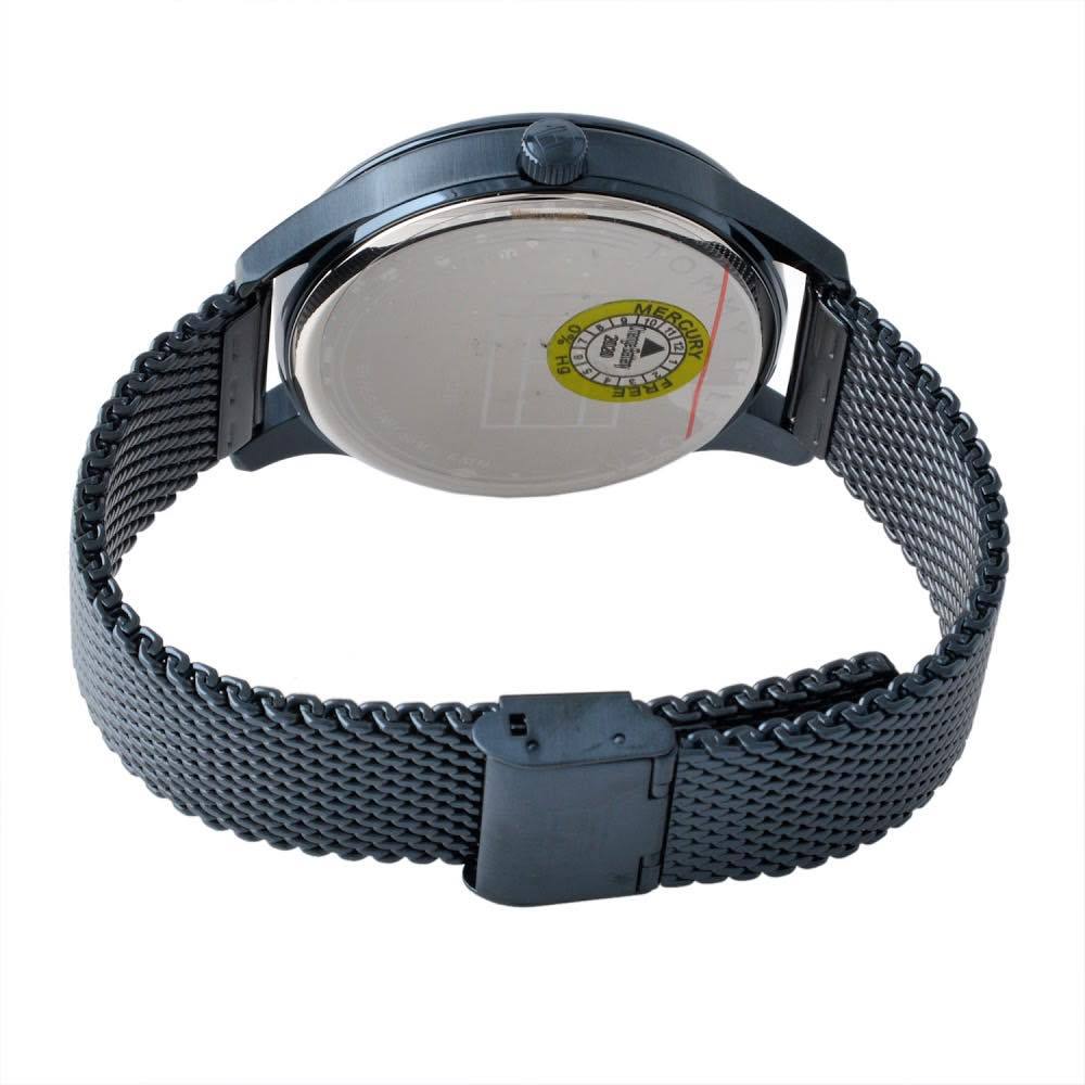 Caseback of Tommy Hilfiger all-blue watch showing case back detail and mesh strap
