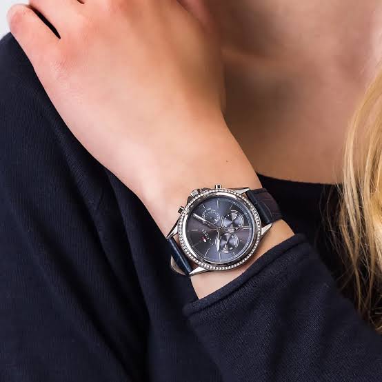 Tommy Hilfiger Ari diamond chronograph watch worn on wrist with blue leather strap