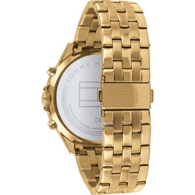 Tommy Hilfiger Austin watch caseback showing transparent exhibition back with gold metal bracelet