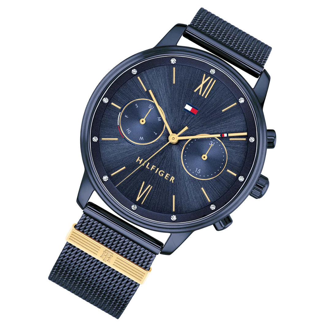 Three-quarter view of Tommy Hilfiger Blake chronograph with blue mesh strap and gold accents