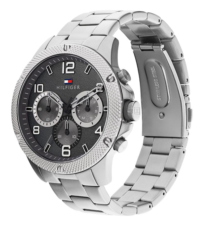 Tommy Hilfiger Blaze watch shown from side angle with full stainless steel link bracelet