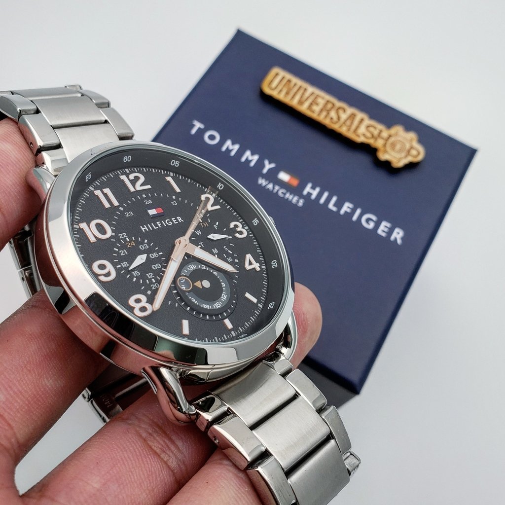 Tommy Hilfiger Briggs chronograph watch with navy blue presentation box and gold charm