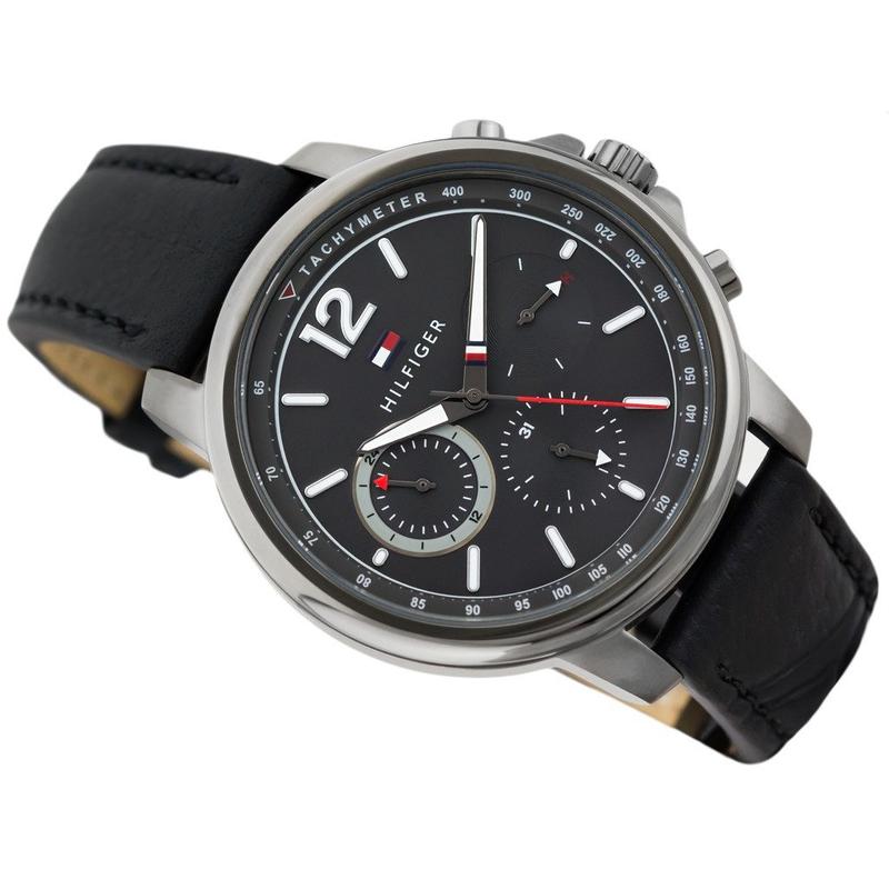 Tommy Hilfiger chronograph watch angled view showing black dial and leather strap