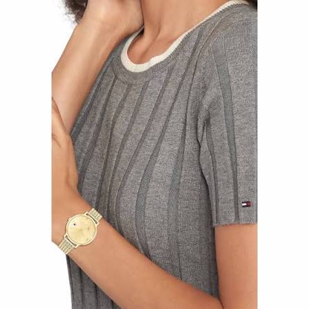 Tommy Hilfiger Classic women's watch on wrist with gold-tone mesh strap