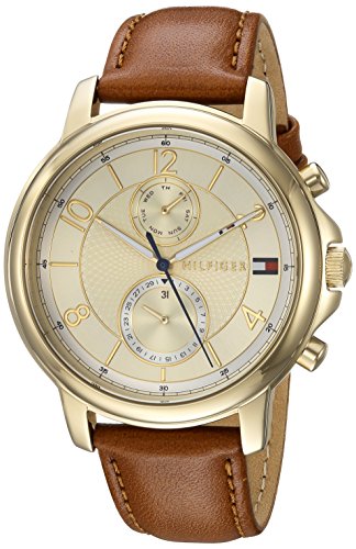 Tommy Hilfiger Claudia women's watch at angle showing gold case and brown leather strap