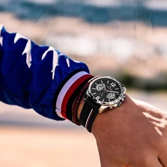 Tommy Hilfiger Decker chronograph watch worn on wrist with black dial and rubber strap