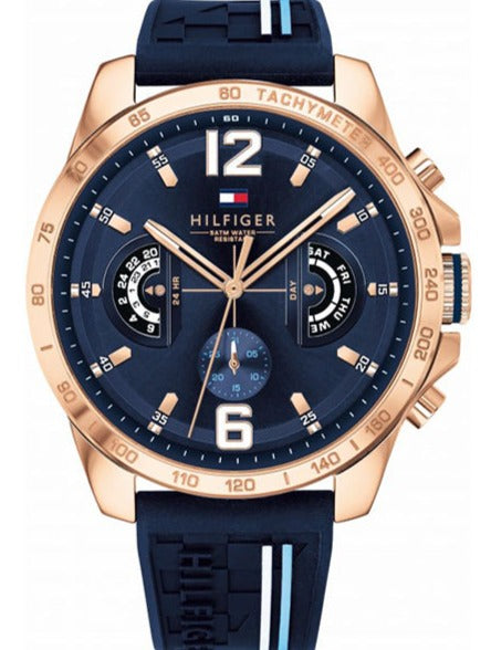 Tommy Hilfiger Decker watch with blue dial, rose gold case, and blue rubber strap