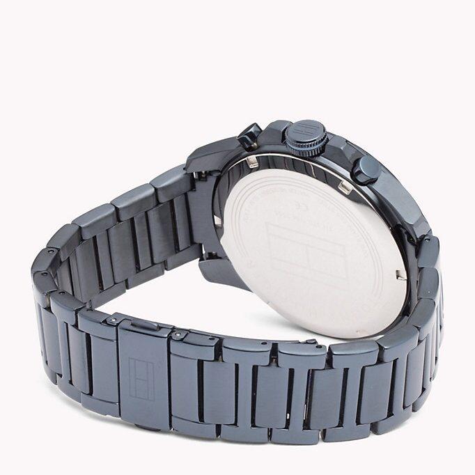 Caseback view of Tommy Hilfiger Decker watch showing blue ion-plated steel back with engraved logo