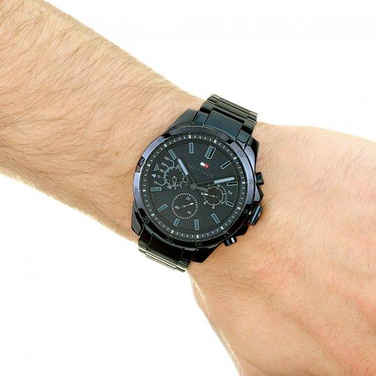 Side view of Tommy Hilfiger Decker watch worn on wrist showing profile and bracelet