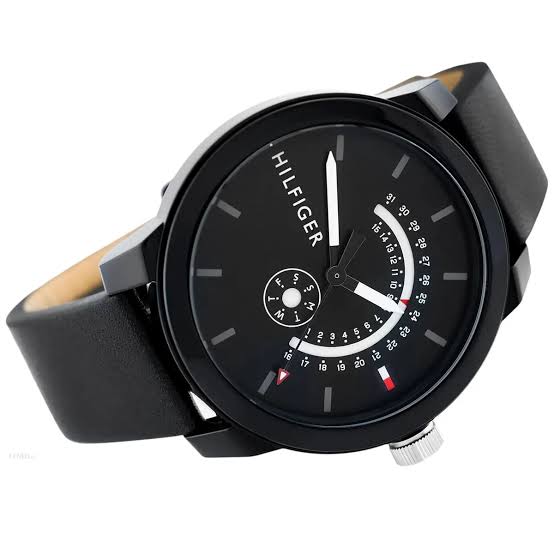 Tommy Hilfiger Denim watch angled view showing black dial and leather strap