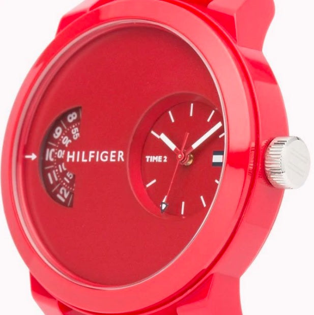 Side angle view of red Tommy Hilfiger Denim Sport watch showing case profile and silicone strap