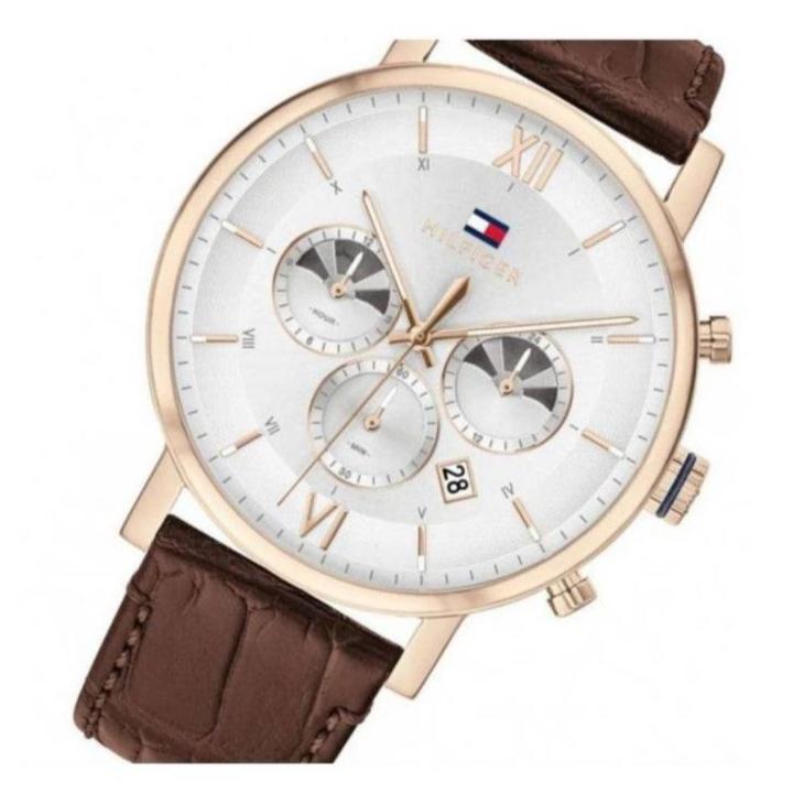 Tommy Hilfiger Evan dial detail showing chronograph subdials, white face, and Roman numerals