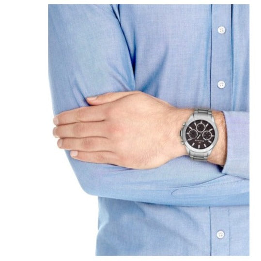 Tommy Hilfiger Hudson watch worn on wrist with brown dial chronograph visible
