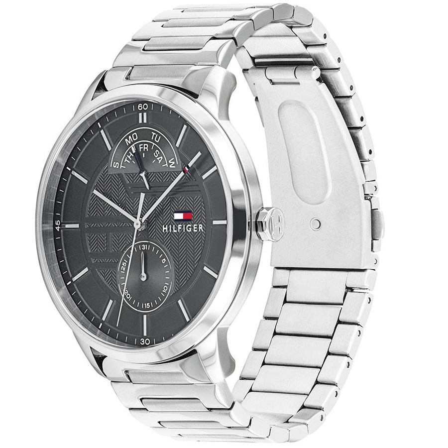Tommy Hilfiger Hunter watch angle view showing silver metal bracelet and dark dial