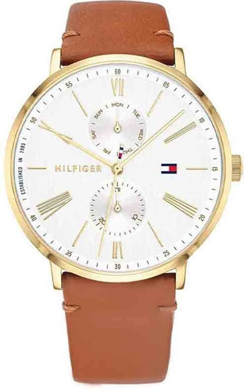 Tommy Hilfiger Jenna women's watch with gold case, white dial, Roman numerals, and brown leather strap