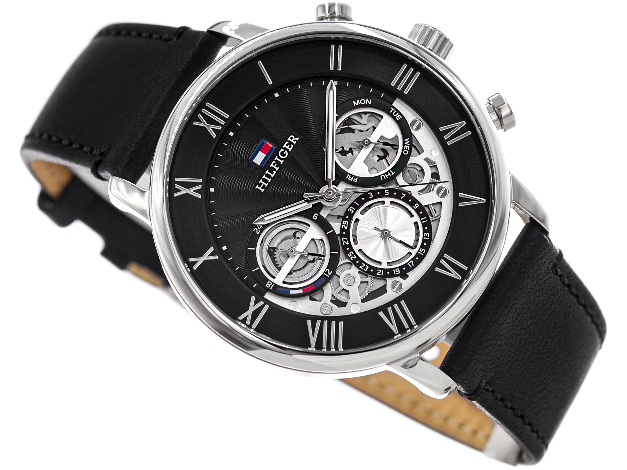 Three-quarter view of Tommy Hilfiger Legend chronograph showing dial and black leather strap