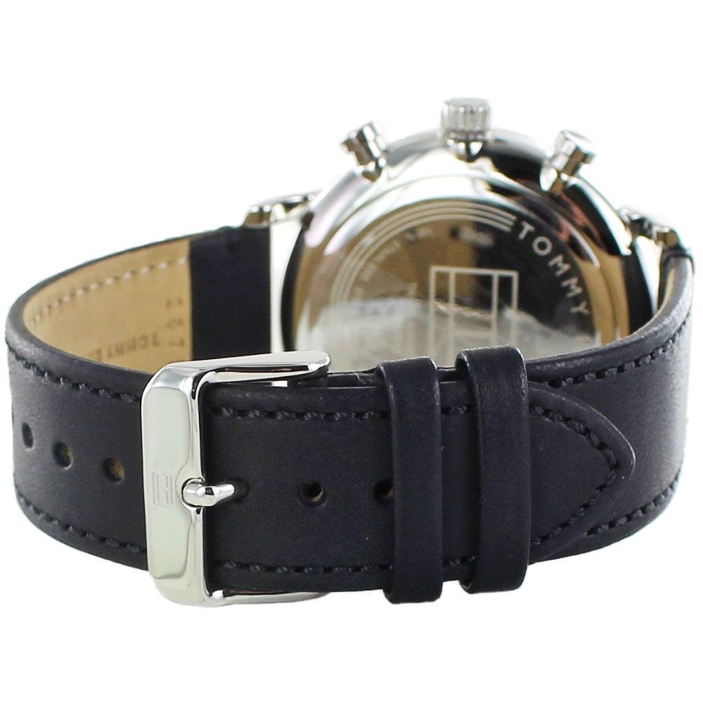 Black leather strap with tan suede lining and stainless steel buckle clasp