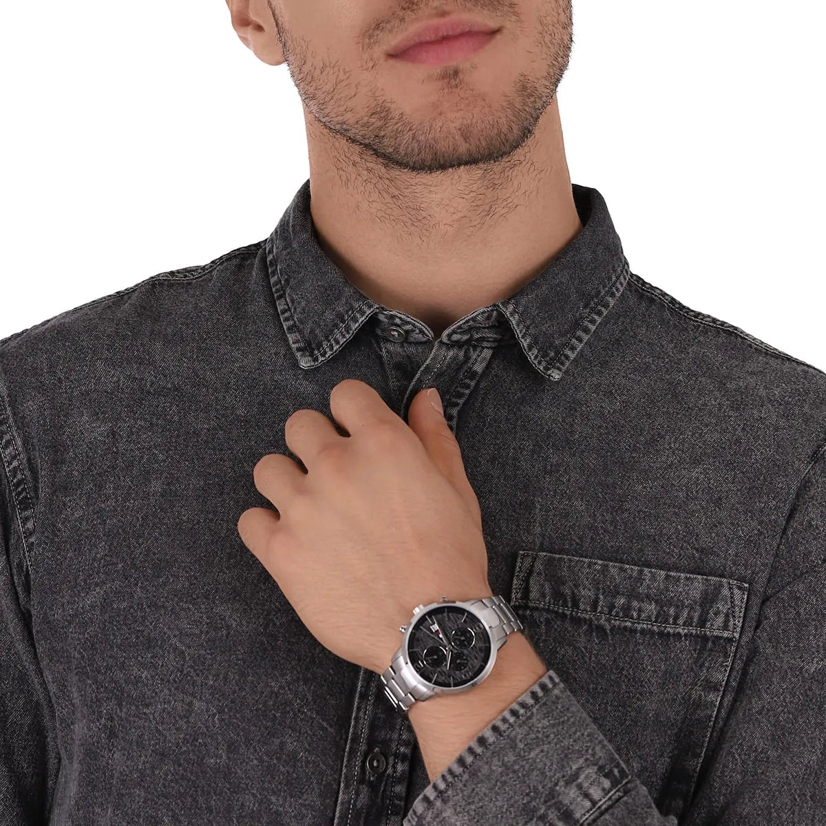 Tommy Hilfiger Liam chronograph watch on wrist with casual styling, black dial visible