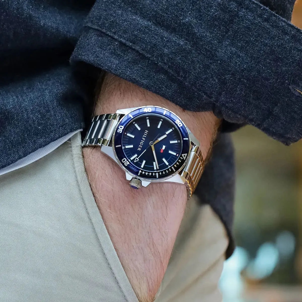 Tommy Hilfiger Logan watch worn on wrist with blue dial visible