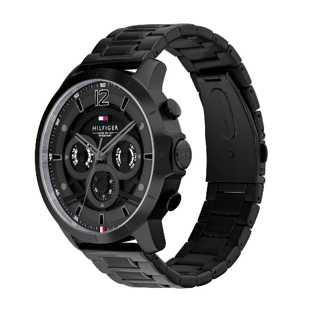 Tommy Hilfiger Luca watch displayed at angle showing black steel case and band
