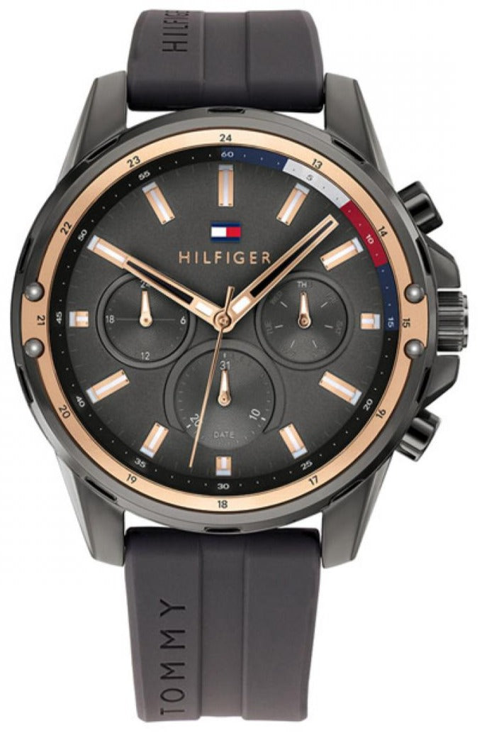 Tommy Hilfiger Mason chronograph watch with black dial and rose gold bezel on black rubber strap