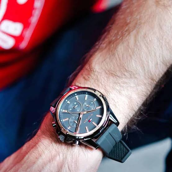 Tommy Hilfiger Mason chronograph watch worn on wrist with black dial and rose gold details
