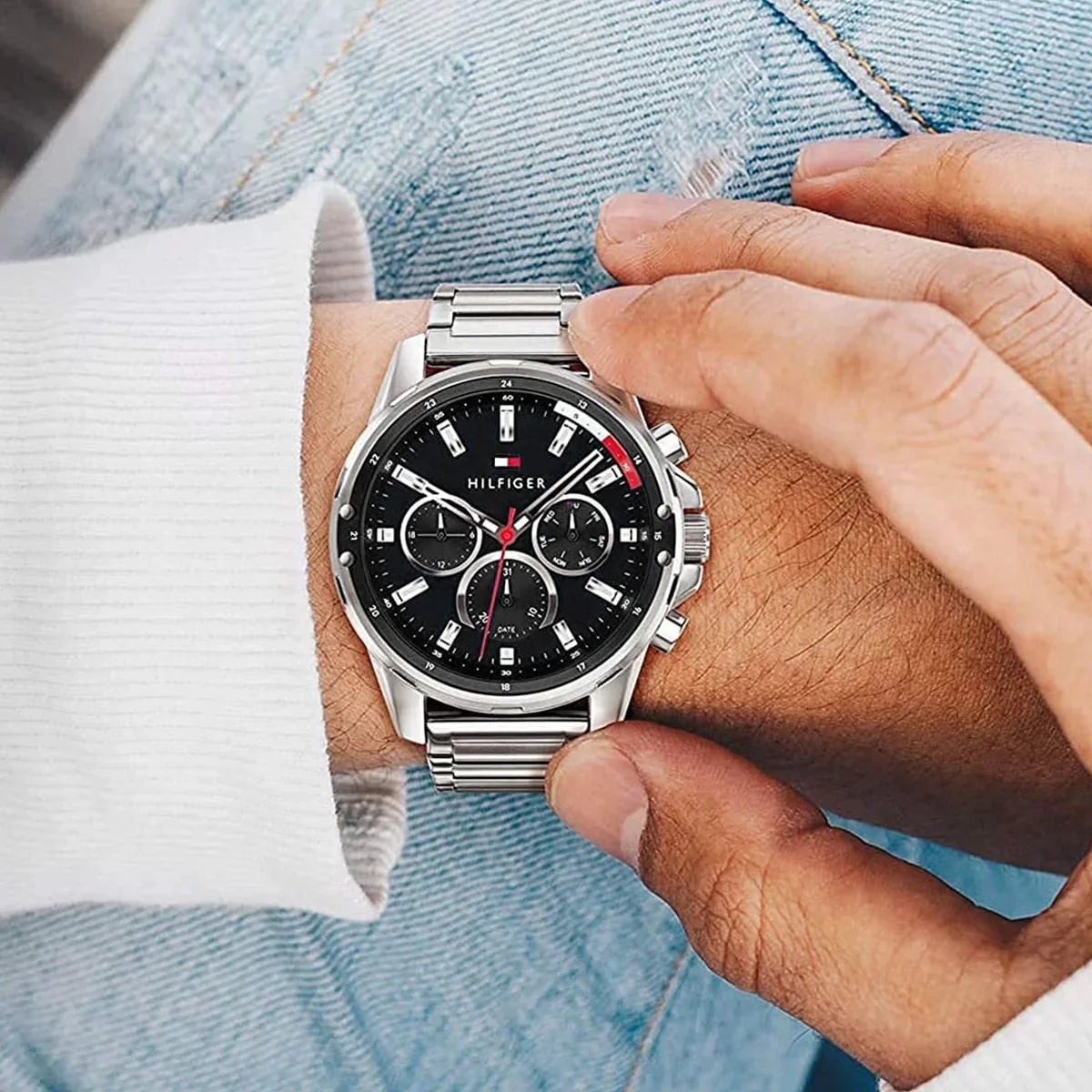 Tommy Hilfiger Mason chronograph watch on wrist featuring black dial and chronograph subdials